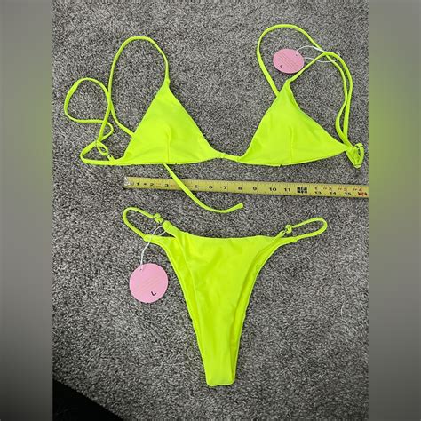 Sanori swim - This pretty neon yellow item is similar in style to our best selling zakynthos style and cheeky cut but comes with adjustable straps. Perfect to adjust to your gorgeous curves and allows to wear the bottoms both low and high waisted. Model is wearing the matching yellow orange Bora Collection top. Fit & Care.